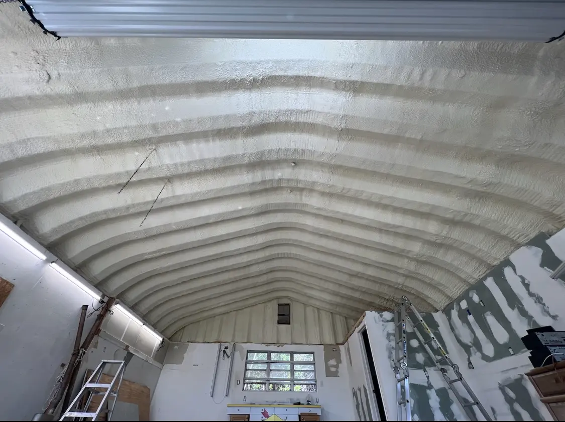 Spray polyurethane foam applied to the underside of a metal roof deck in Whitewater